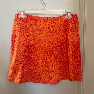 Orange Cheetah print mini skirt